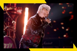 Rocker Billy Idol wails in concert.