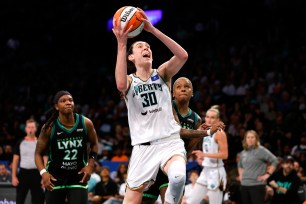 Liberty forward Breanna Stewart (30) drives to the basket against Minnesota Lynx guard Courtney Williams (10) during the second half at the Barclays Center. Sunday, Sept. 15, 2024