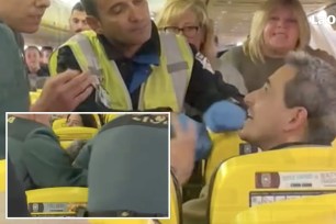 A Ryanair passenger who claimed to be a United Nations diplomat was dragged out of a Spanish flight after throwing a tantrum and demanding a front row seat.