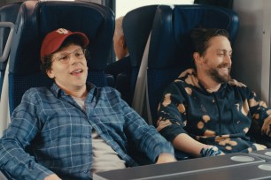 Jesse Eisenberg and Kieran Culkin on a train in a scene from "A Rail Pain."