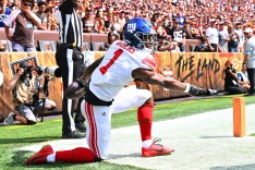 Malik Nabers #1 of the New York Giants celebrating his touchdown reception against the Cleveland Browns at the Cleveland Browns Stadium