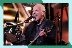 Classic rocker Peter Frampton performs while wielding a guitar.