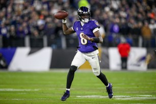 Lamar Jackson throws a pass during the Ravens' AFC wild-card win over the Steelers.